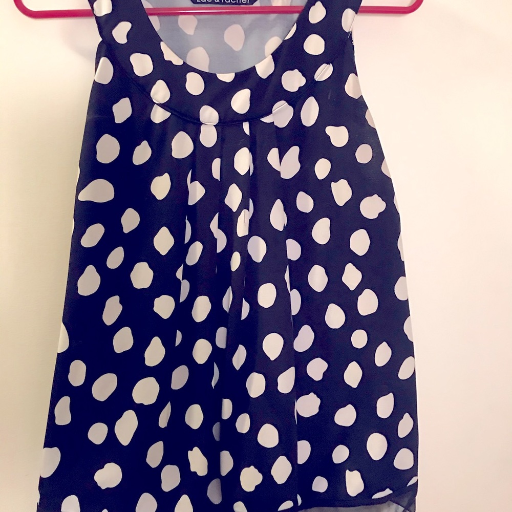 Black and white polka dotted top woman’s small